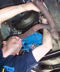 Employee working on a car.